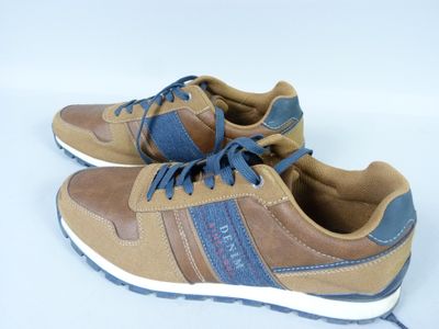 brown and blue sneakers on a white surface with a white background