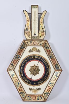 an old clock with a decorative design on the front of it