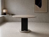 a marble table in the middle of a room with a large window