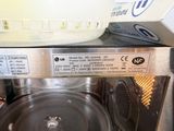 a close up of a microwave with a pan inside of it