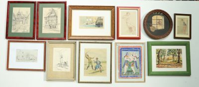 a lot of framed pictures on the wall of this room