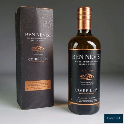 an image of a bottle of wine next to a box