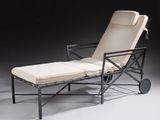 une image représentant un fauteuil inclinable sur lequel est posé un coussin