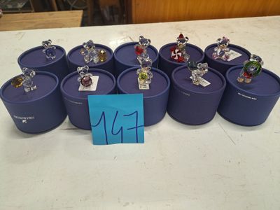 a lot of small figurines sitting on top of a table