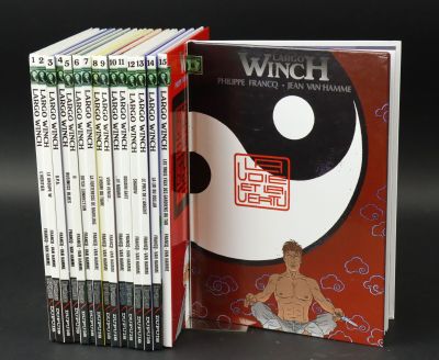 a lot of books that are stacked on top of each other