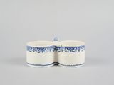 two blue and white dishes sitting on top of each other