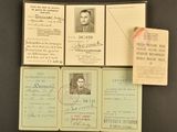 an image of a bunch of old papers with a picture of a man on them