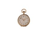 une petite montre de poche en or avec des chiffres romains