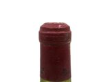 a bottle of wine that is sitting on a table