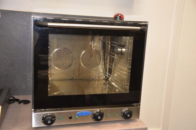 an image of a toaster oven sitting on top of a counter