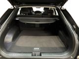 the back of a car with the trunk open and the seats down