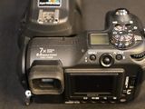 a close up of a camera with a flash light on it