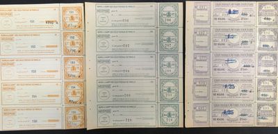 trois types différents de billets de banque posés sur une table noire