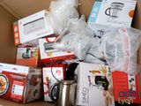 a cardboard box full of kitchen appliances and other items