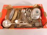 a box with a variety of silverware in it
