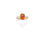 une bague en saphir orange et diamants