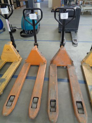 four pallets that are sitting on the floor next to each other
