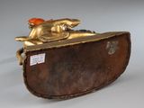 pair of bronze figurines of a horse and rider on a saddle