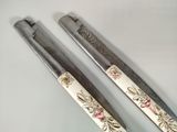 two chopsticks that are sitting on a table