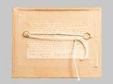 a picture of a piece of paper with a string attached to it