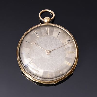 Une montre à boitier rond en or 750‰, le cadran en acier à i…