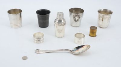 many different types of silverware on a white surface