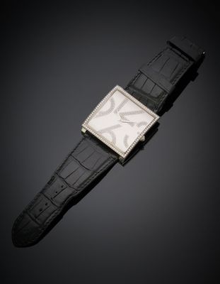 an 18k white gold and diamond set wristwatch