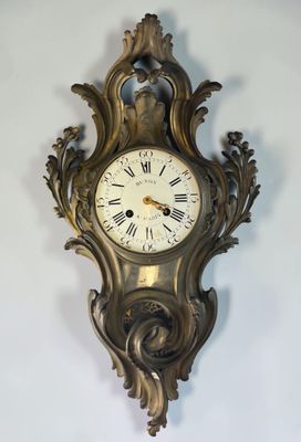 a clock hanging on the wall in the room