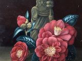 une photo représentant un tableau de fleurs et une statue de Bouddha