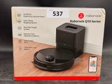 un boîtier sur lequel se trouve une télécommande