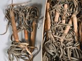 a wooden box with a bunch of rope in it