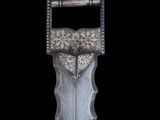 a close up of a knife with a metal handle on a black background