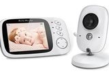 le babyphone est posé à côté d'un autre petit babyphone