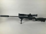 a rifle on a white background with a scope on it