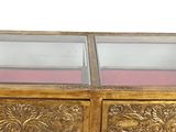 brass chest of drawers with glass doors and drawers on each side