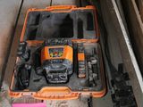a box with tools on top of it in a room
