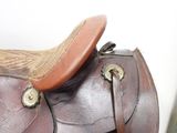 a brown saddle with a brown seat and a brown seat