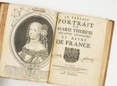 un vieux livre avec l'image d'une femme