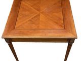 a wooden table with a square top on a white background