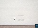 a picture of a piece of paper with a small hole in it