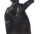 a statue of a man holding a bird in his hand