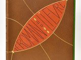 an orange and green book with a brown cover with a leaf on it