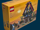 a box that has a lego house in it