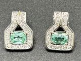 pair of emerald and diamond earrings