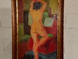 un tableau représentant une femme nue sur un chevalet