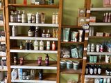 a room with a lot of shelves filled with various items