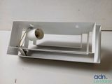 a picture of a toilet paper dispenser with a roll of toilet paper in it