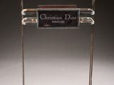 an image of a clear glass display case with a sign on it