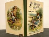 a book with a picture of a woman sitting on a bench