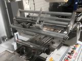 une image représentant une machine sur laquelle se trouve une bobine de papier